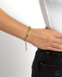 Paparazzi Dancing Decade- Gold and Black Bracelet