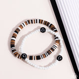 Paparazzi Tabloid Talent - Black Smiley Bracelet